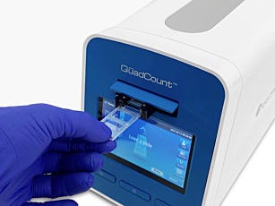 Slide loading in QuadCount Automated Cell Counter by Accuris