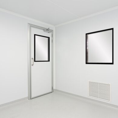 Modular cleanroom wall panel composed of an aluminum honeycomb core with uPVC steel shell provide a stick-built aesthetic  |  6603-66 displayed