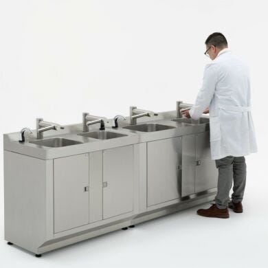 Four-person station with sensor faucets and dryers for efficient gowning room workflows  |  9600-62D displayed