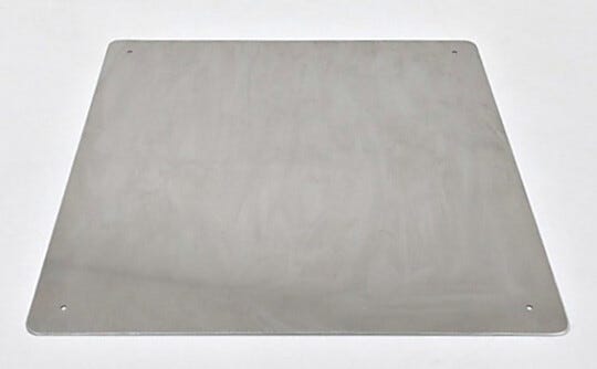 Stainless steel shield, installed on the floor of a plastic desiccator chamber, protects against scratching | 1976-06 displayed