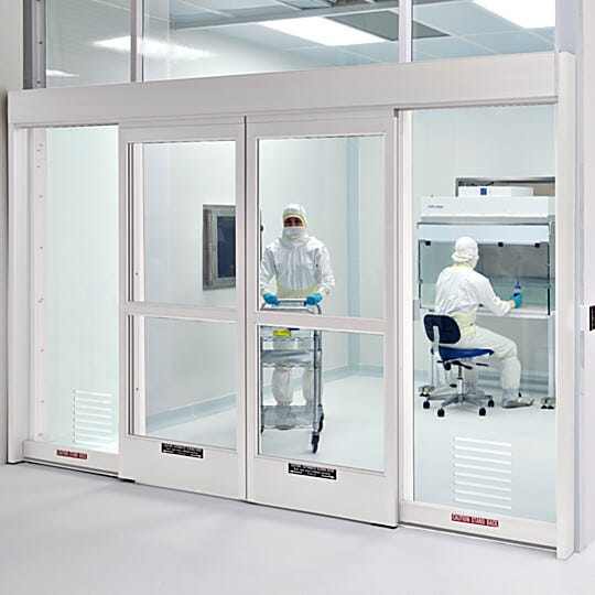 Automatic sliding doors provide cleanroom-compliant operation for use in research, healthcare and educational labs
