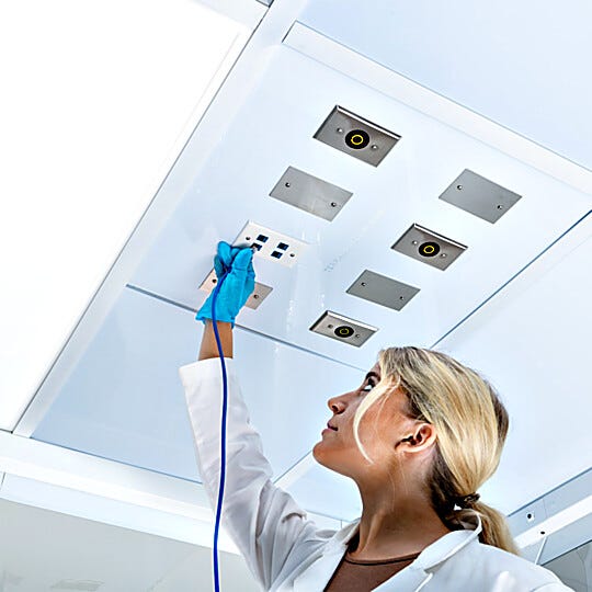 Keep utilities overhead and work areas clear with a 2'×2' polypropylene utility ceiling panel with eight configurable, covered ports | 6706-09 displayed