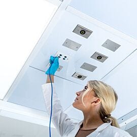 Keep utilities overhead and work areas clear with a 2'×2' polypropylene utility ceiling panel with eight configurable, covered ports  |  6706-09 displayed