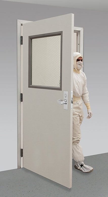 UL-listed fire-rated door with wired-glass window, shown with optional mortise locking mechanism and hinges installed