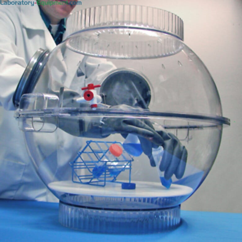 Bel-Art Polycarbonate 2 Glove Ports Techni-Dome Glove Box shown with model and props | 1539-06 displayed