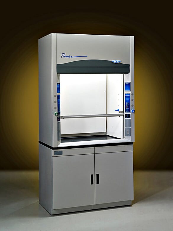 Four foot Protector Premier laboratory fume hoods by Labconco shown with optional storage cabinets | 3649-00 displayed