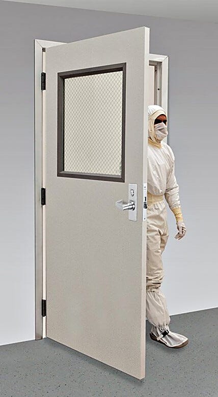 UL-listed fire-rated door with wired-glass window, shown with optional mortise locking mechanism and hinges installed