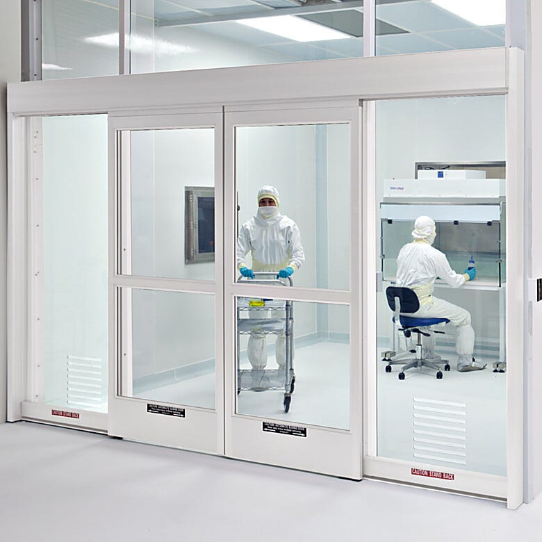 Automatic sliding doors provide cleanroom-compliant operation for use in research, healthcare and educational labs