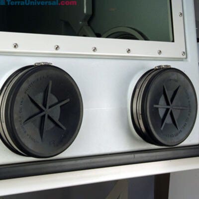 Shown are exterior glove port covers placed over gloveports on a Labconco glovebox. | 3643-51 displayed
