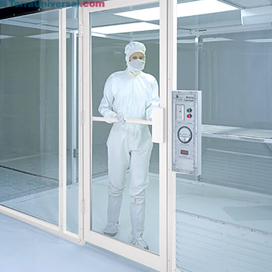 Swing door with powder-coated aluminum frame.
